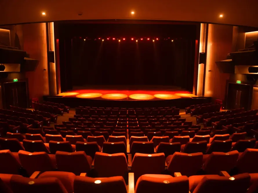 Interior view of Sheila Gopal Raheja Auditorium at Bal Gandharva Rang Mandir, Bandra – showing back seating and stage area